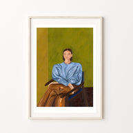 Framed painting of a person wearing a blue shirt and brown pants sat on a chair