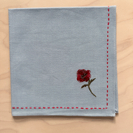 Poppy embroidered blue napkin set