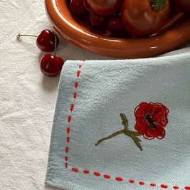 Poppy embroidered blue napkin set
